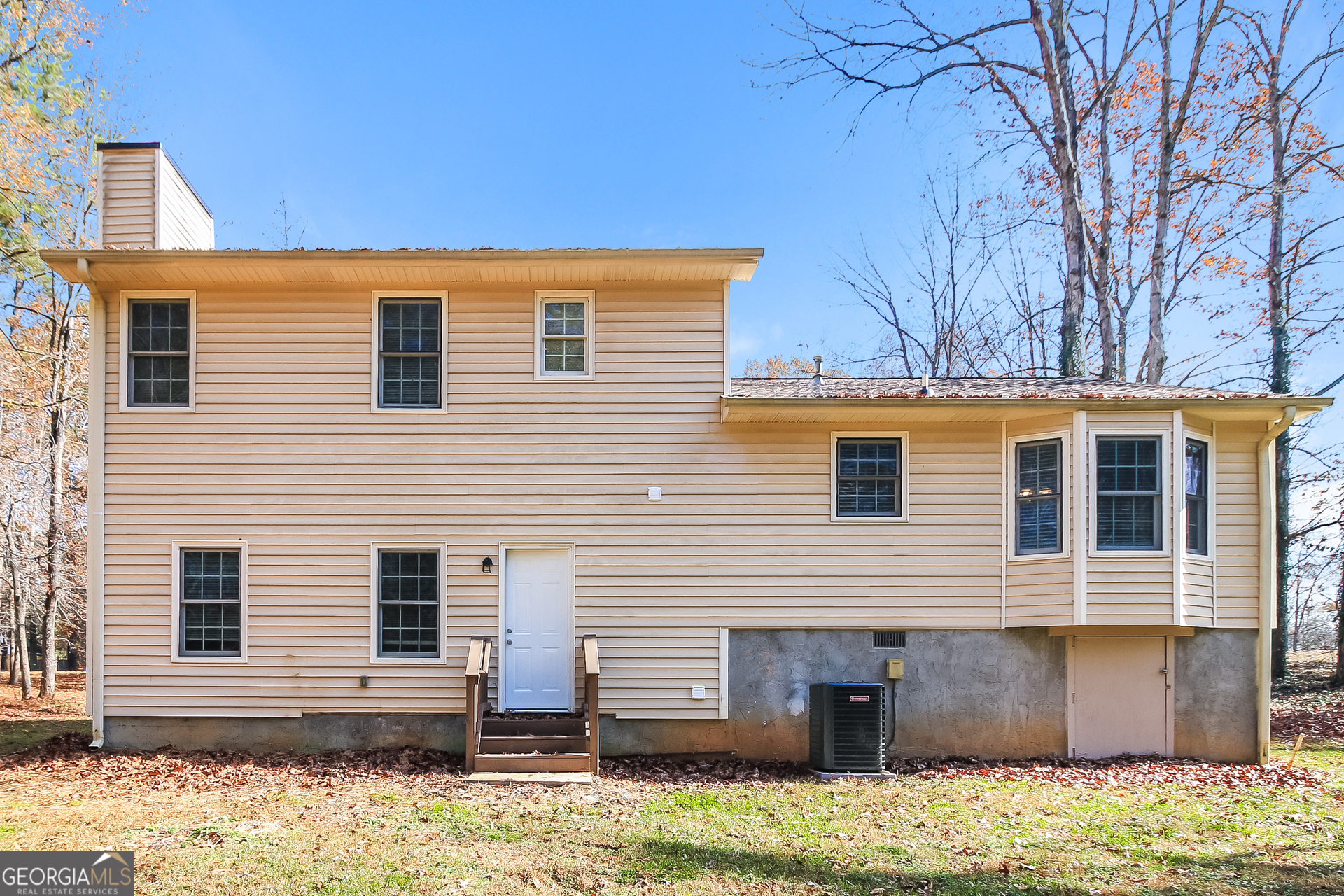 632 Cloudland Drive Stockbridge, GA 30281 - Photo 15 of 18 a front view of a house with a yard