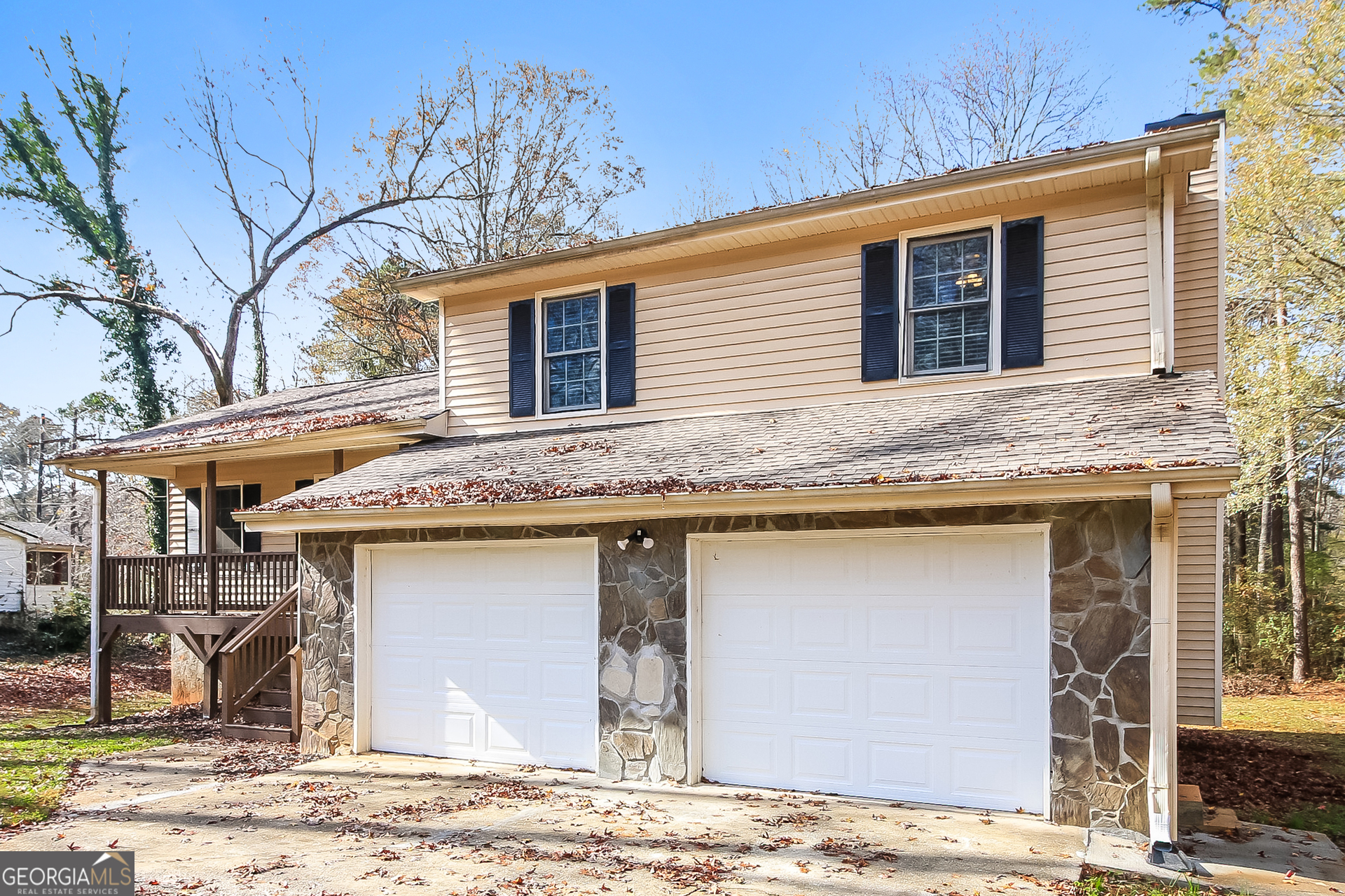 632 Cloudland Drive Stockbridge, GA 30281 - Photo 2 of 18 a view of a house with a roof deck