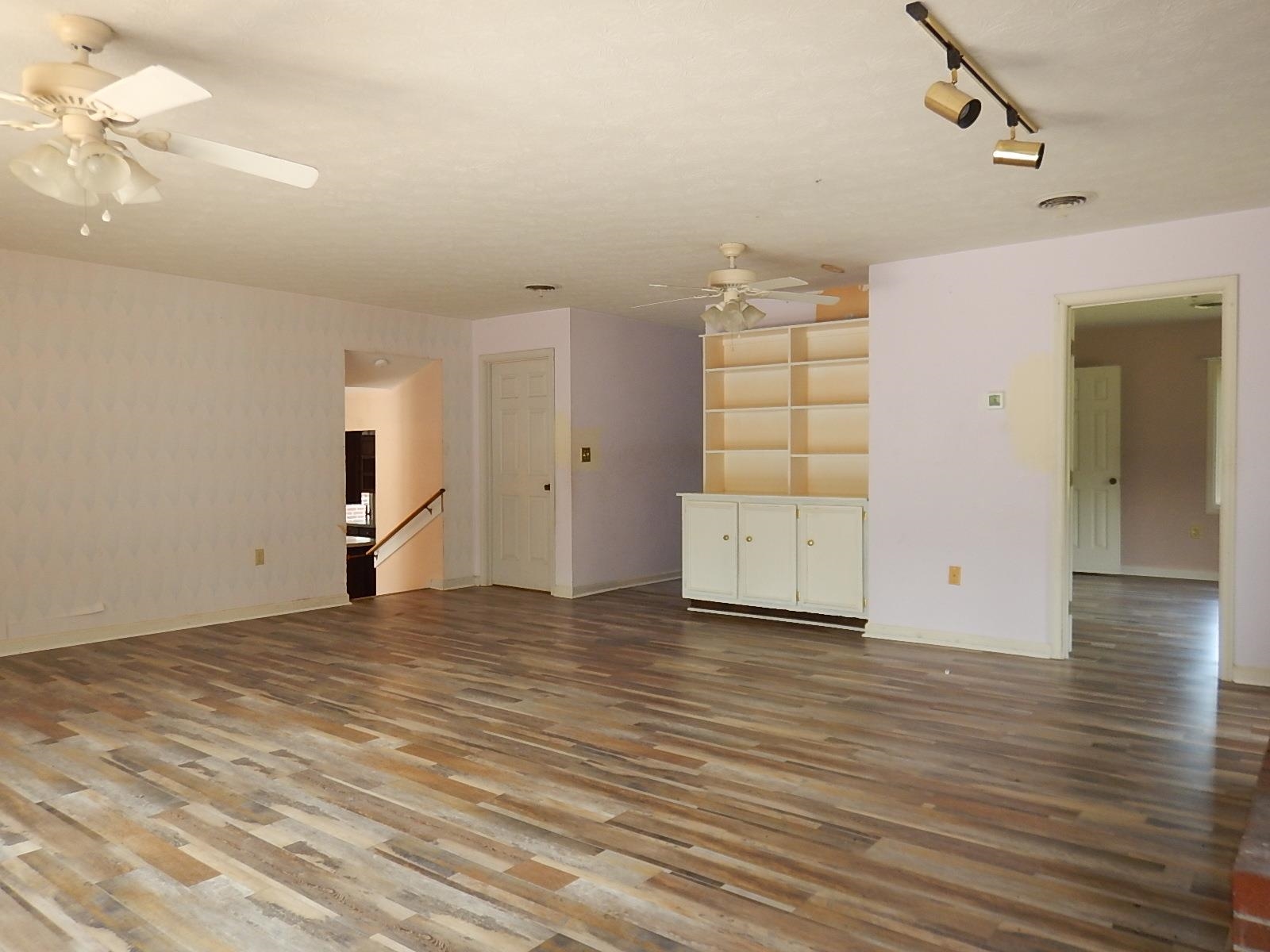 161 Smoky Row Road Staunton, VA 24401 - Photo 13 of 25 an empty room with wooden floor and windows
