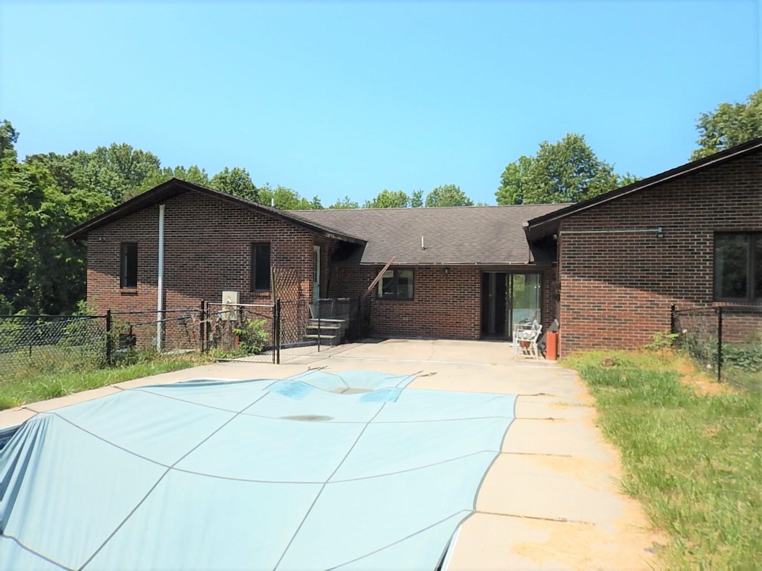 161 Smoky Row Road Staunton, VA 24401 - Photo 20 of 25 a backyard of a house with table and chairs