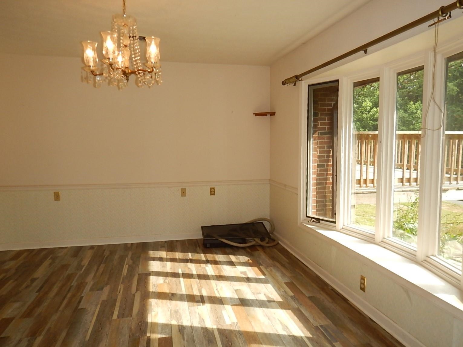 161 Smoky Row Road Staunton, VA 24401 - Photo 5 of 25 a room with window and a chandelier