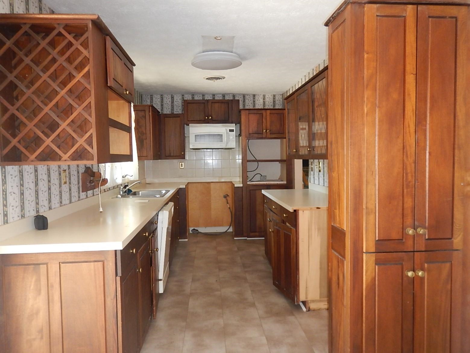 161 Smoky Row Road Staunton, VA 24401 - Photo 6 of 25 a kitchen with a sink and a refrigerator
