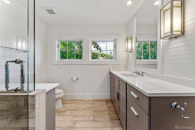 a bathroom with a sink and a bathtub