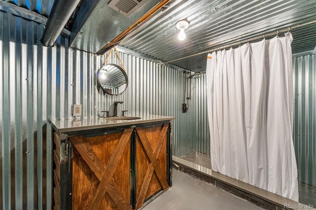 a view of a door and wooden floor in a balcony