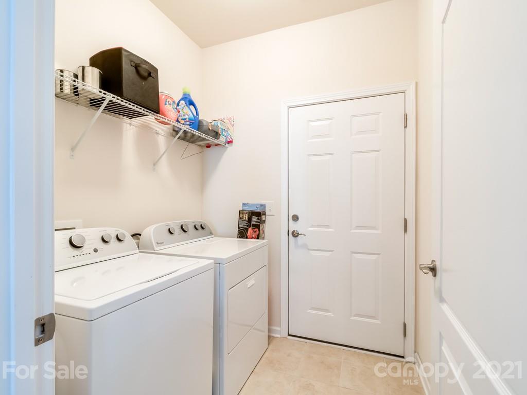 4142 Perth Road Indian Land, SC 29707 - Photo 22 of 26 a utility room with dryer and washer