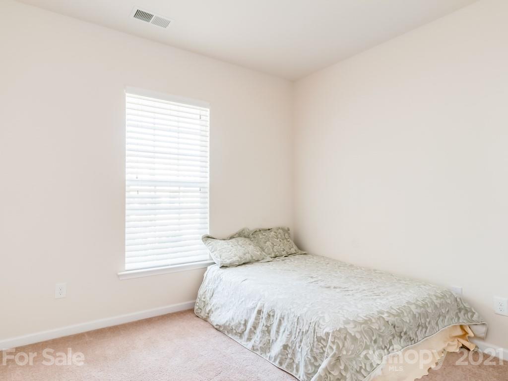 4142 Perth Road Indian Land, SC 29707 - Photo 5 of 26 a bedroom with a bed and a window