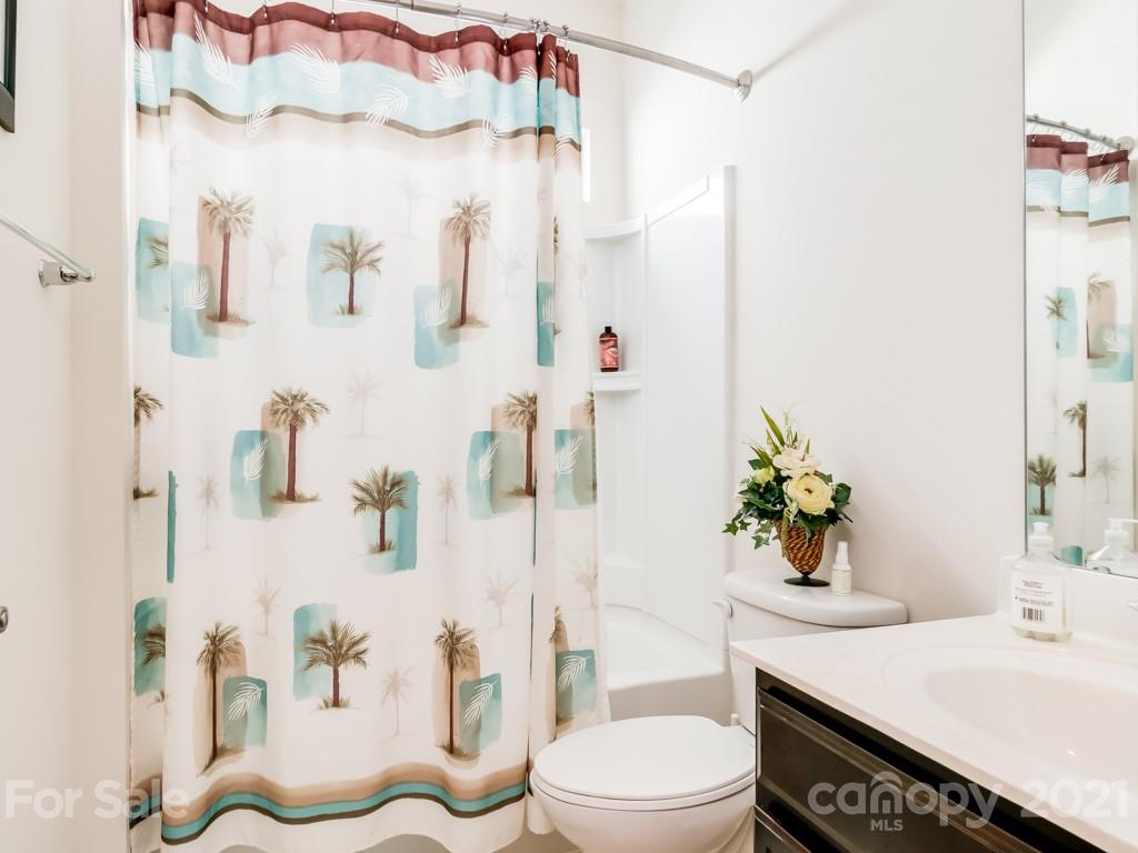 4142 Perth Road Indian Land, SC 29707 - Photo 6 of 26 a bathroom with a sink mirror vanity and toilet