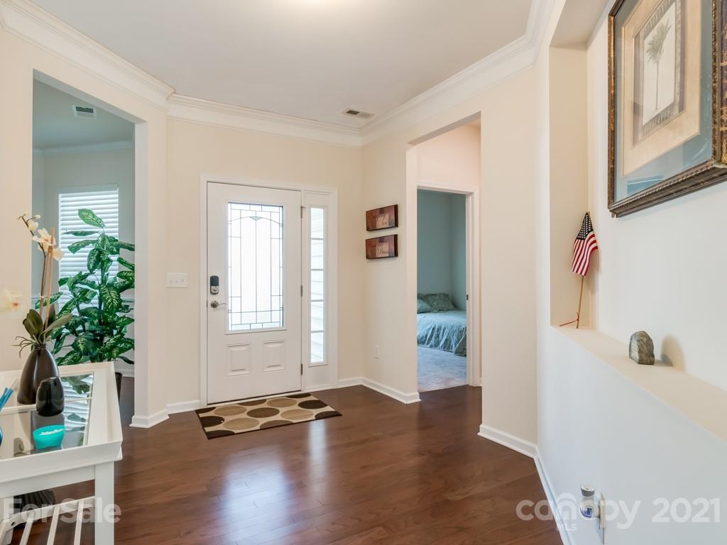 4142 Perth Road Indian Land, SC 29707 - Photo 8 of 26 a view of an entryway with wooden floor and windows