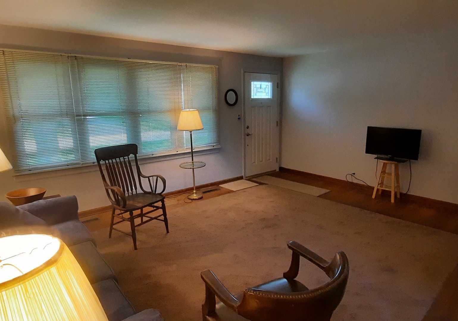 240 West Tower Road Barrington, IL 60010 - Photo 7 of 17 a living room with furniture and a flat screen tv