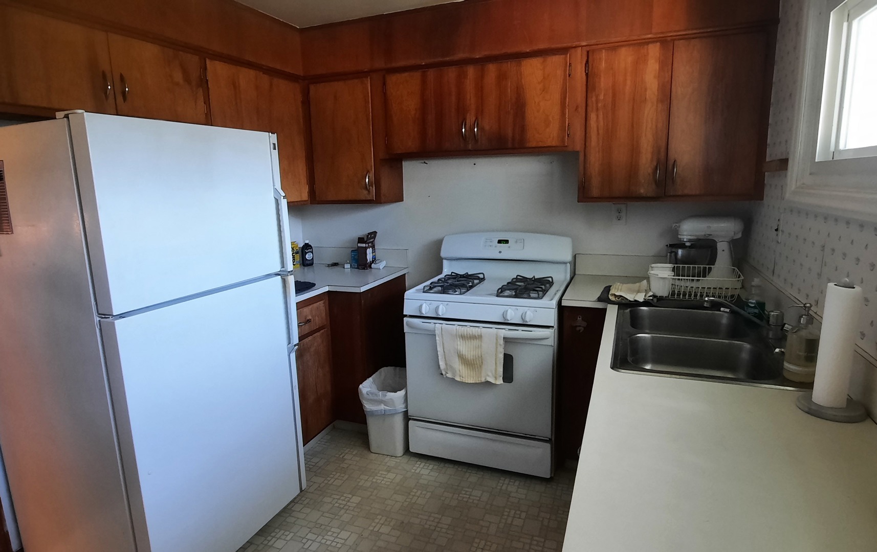 240 West Tower Road Barrington, IL 60010 - Photo 10 of 17 a utility room with fridge dryer and washer