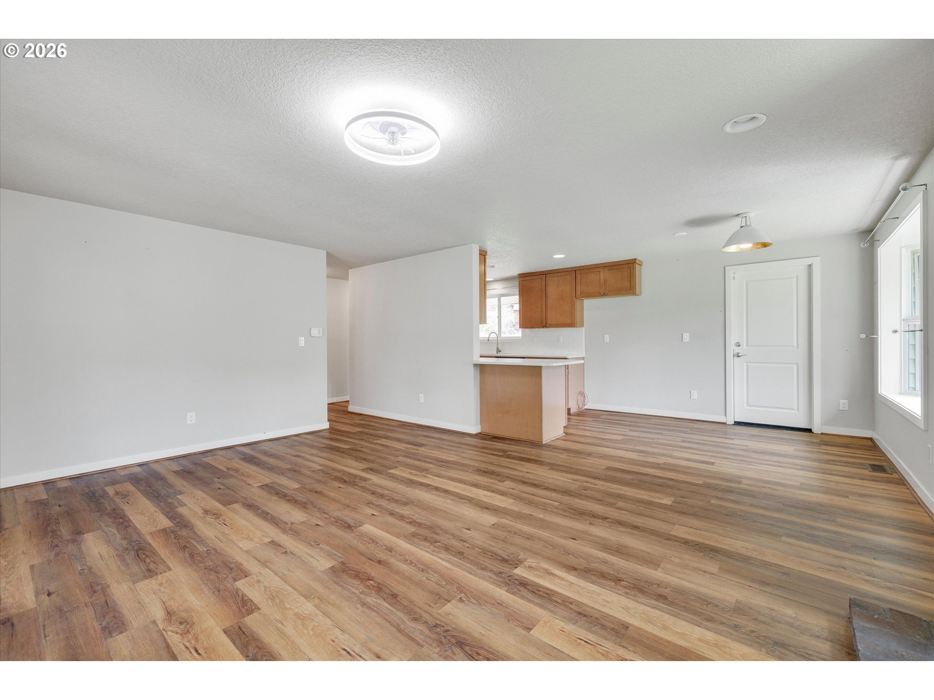 17139 South Bradley Road Oregon City, OR 97045 - Photo 14 of 47 a view of empty room with wooden floor