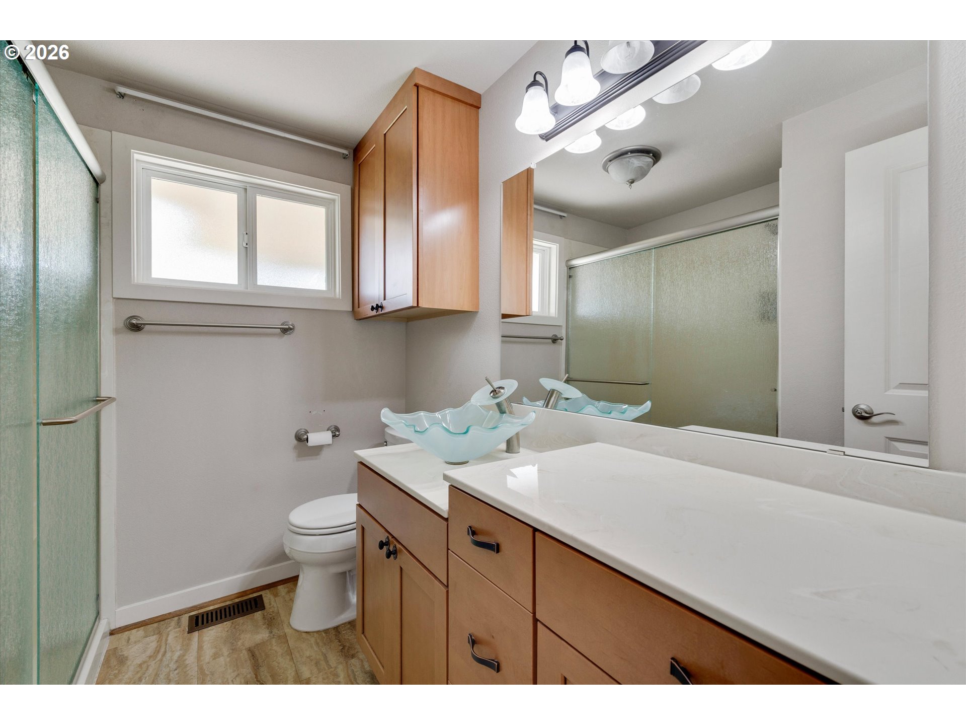 17139 South Bradley Road Oregon City, OR 97045 - Photo 21 of 47 a bathroom with a sink vanity granite toilet and a mirror