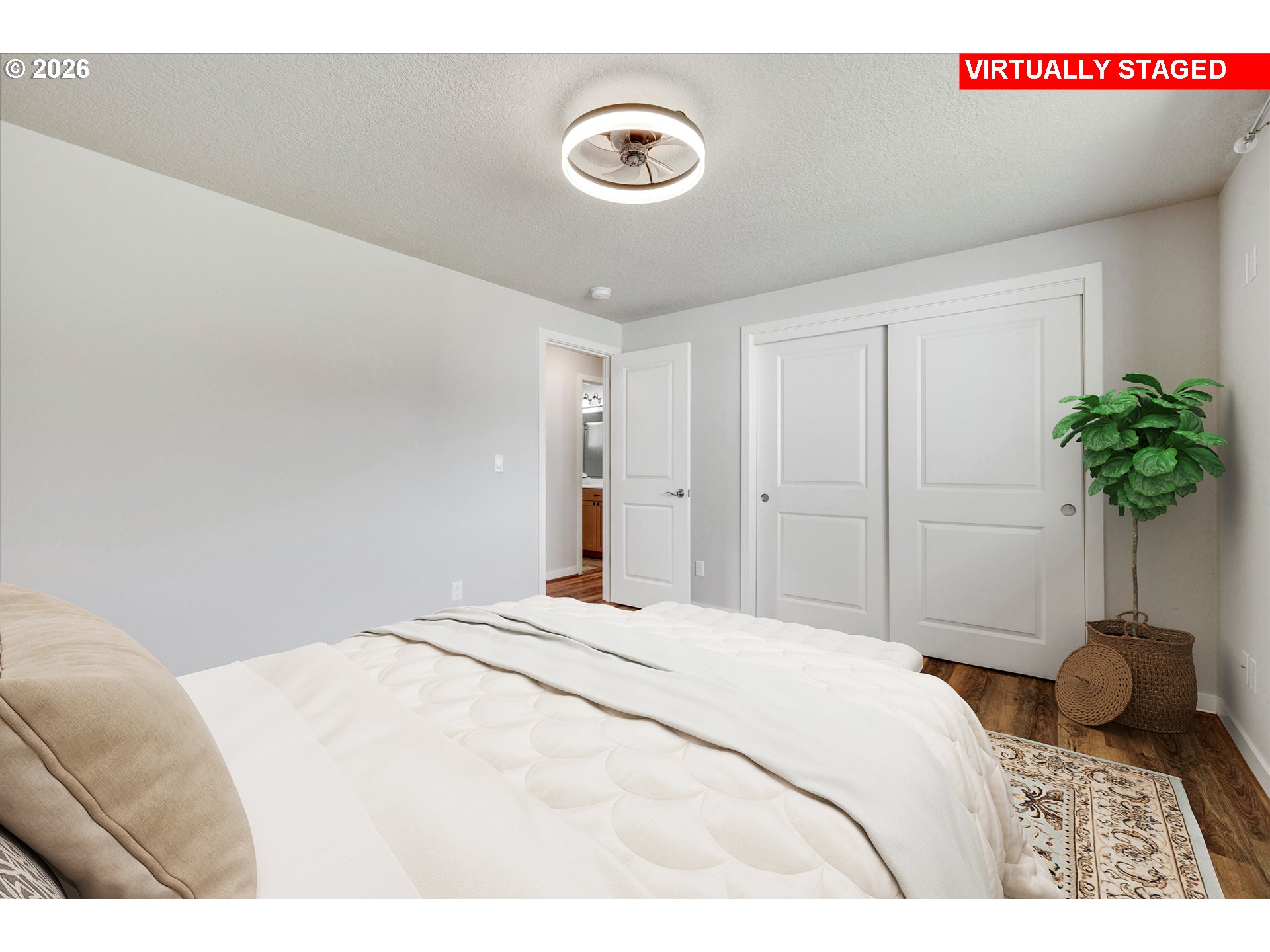 17139 South Bradley Road Oregon City, OR 97045 - Photo 23 of 47 a bedroom with a bed and a plant