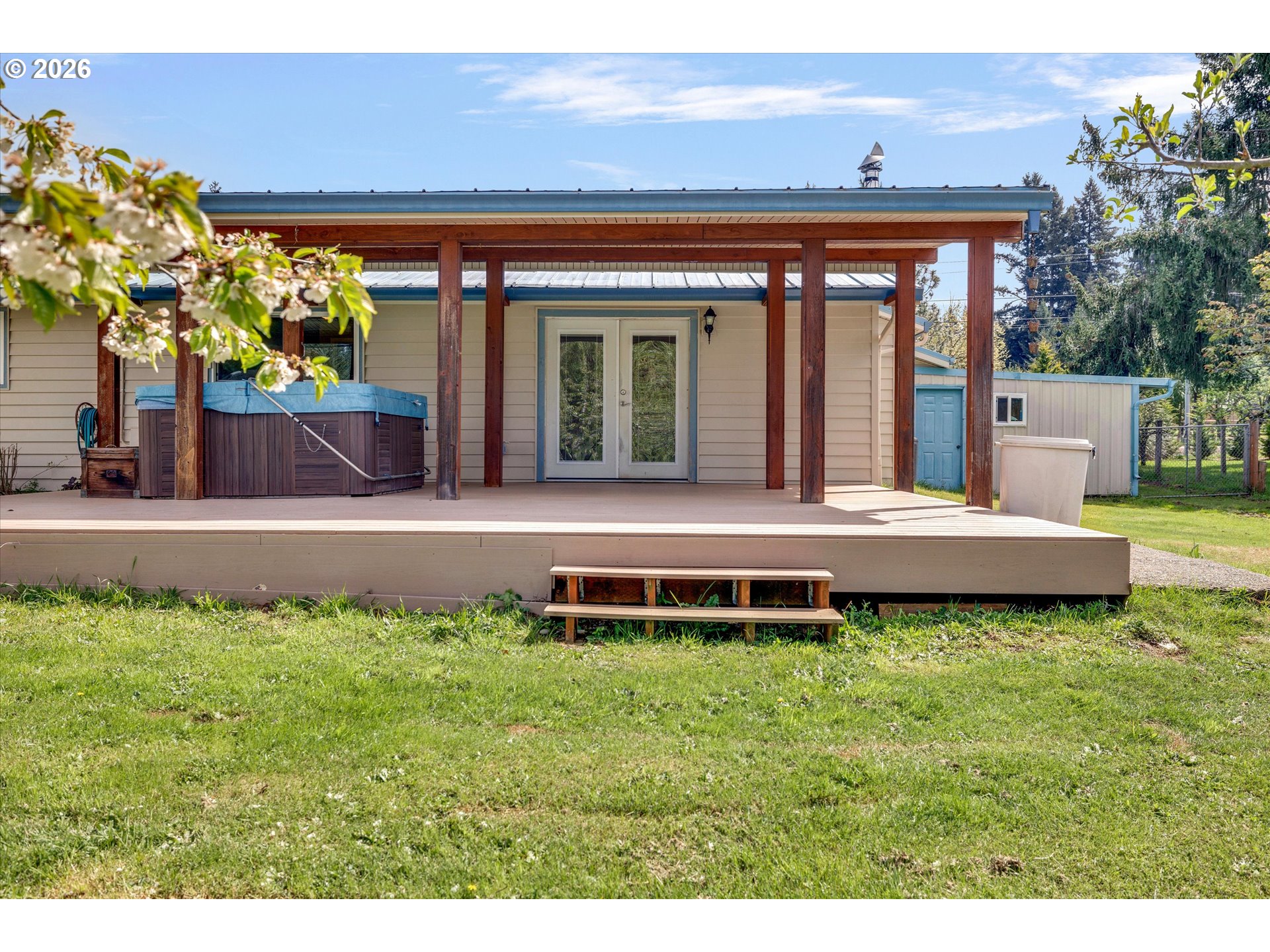 17139 South Bradley Road Oregon City, OR 97045 - Photo 27 of 47 a view of a house with a yard patio and fire pit