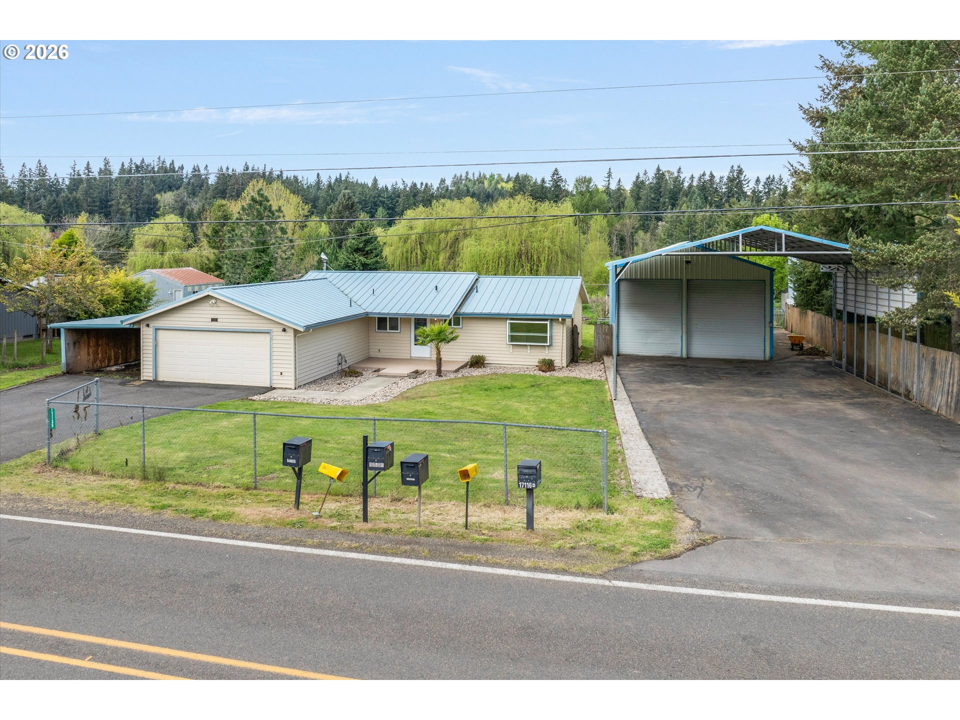 17139 South Bradley Road Oregon City, OR 97045 - Photo 37 of 47 an aerial view of a house with a yard