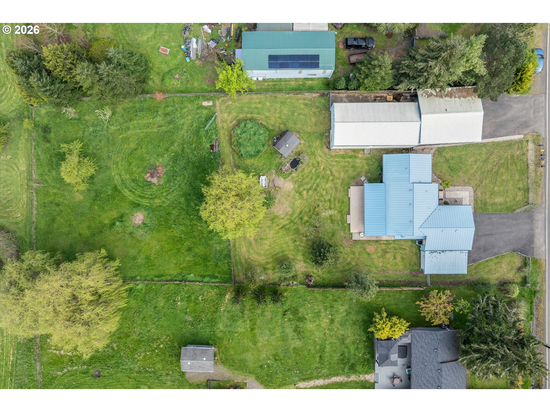 17139 South Bradley Road Oregon City, OR 97045 - Photo 44 of 47 a view of a house with a yard