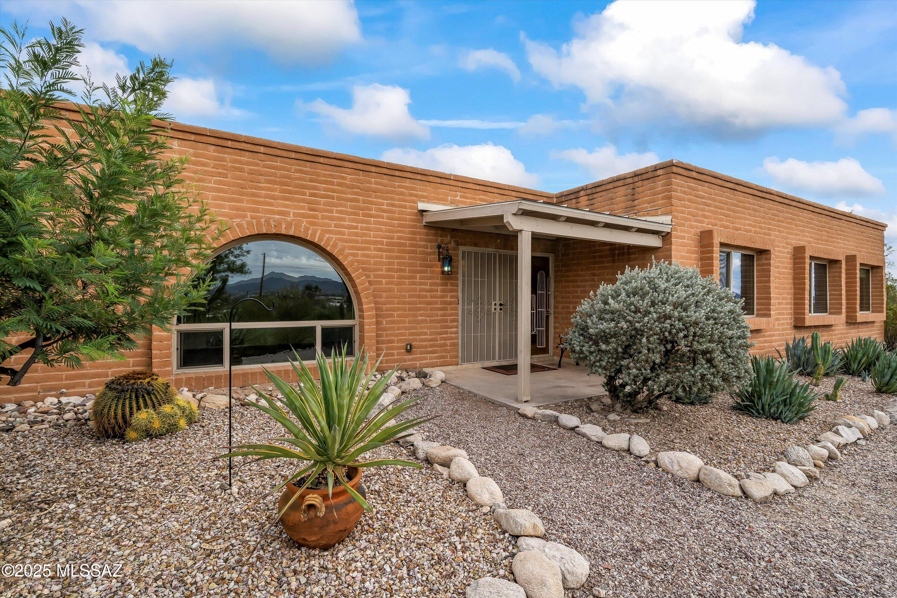 1601 West Sunset Road Tucson, AZ 85704 - Photo 1 of 47 01-Front of Home