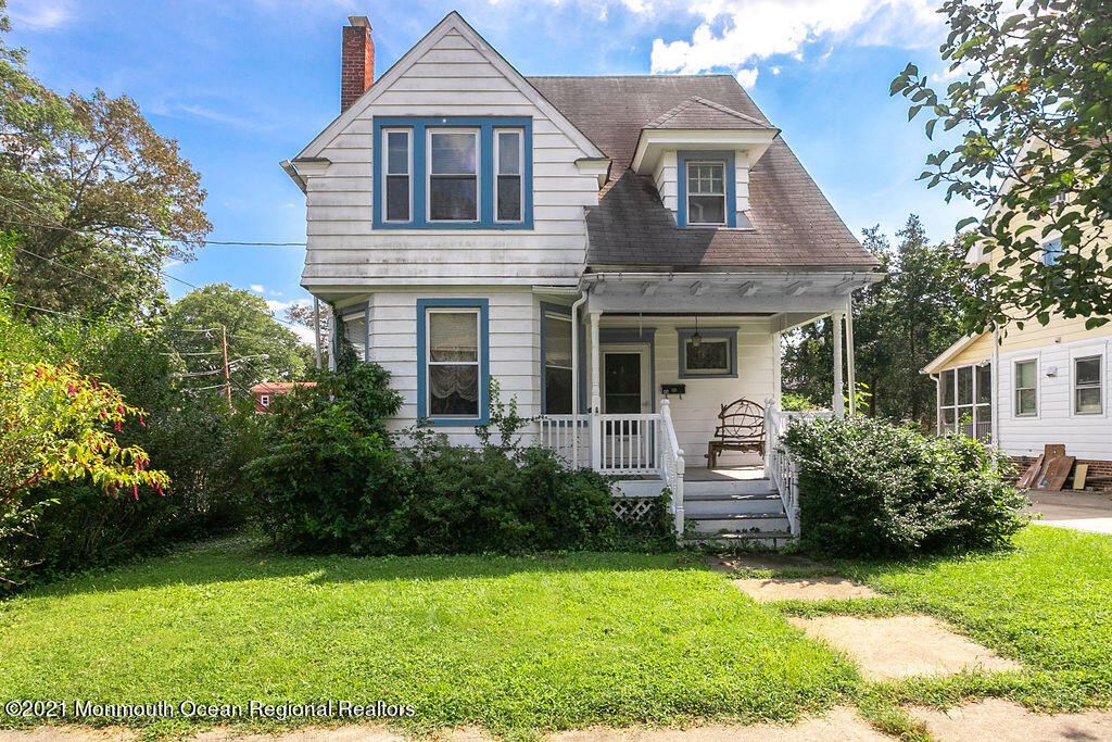 48 Ridgway Street Mount Holly, NJ 08060 - Photo 2 of 24 a front view of a house with a yard