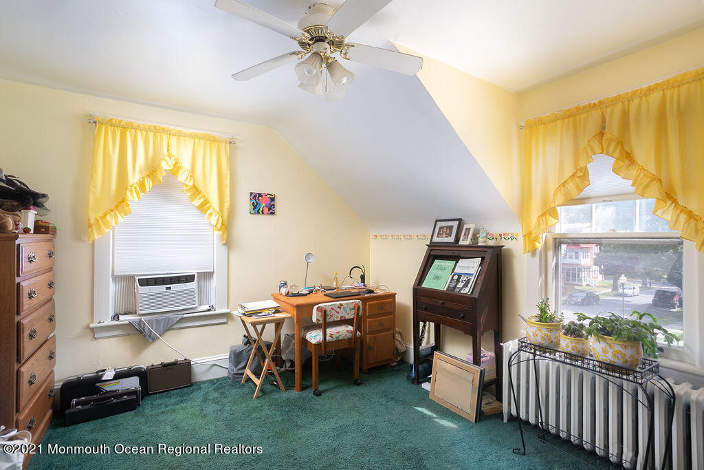 48 Ridgway Street Mount Holly, NJ 08060 - Photo 15 of 24 a bedroom with furniture and a window