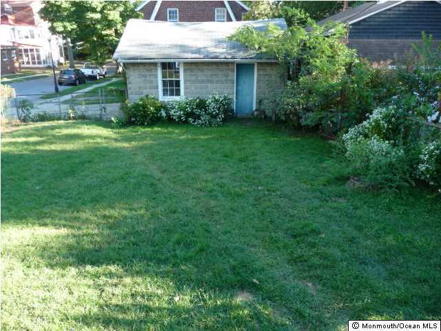 48 Ridgway Street Mount Holly, NJ 08060 - Photo 19 of 24 a front view of a house with garden