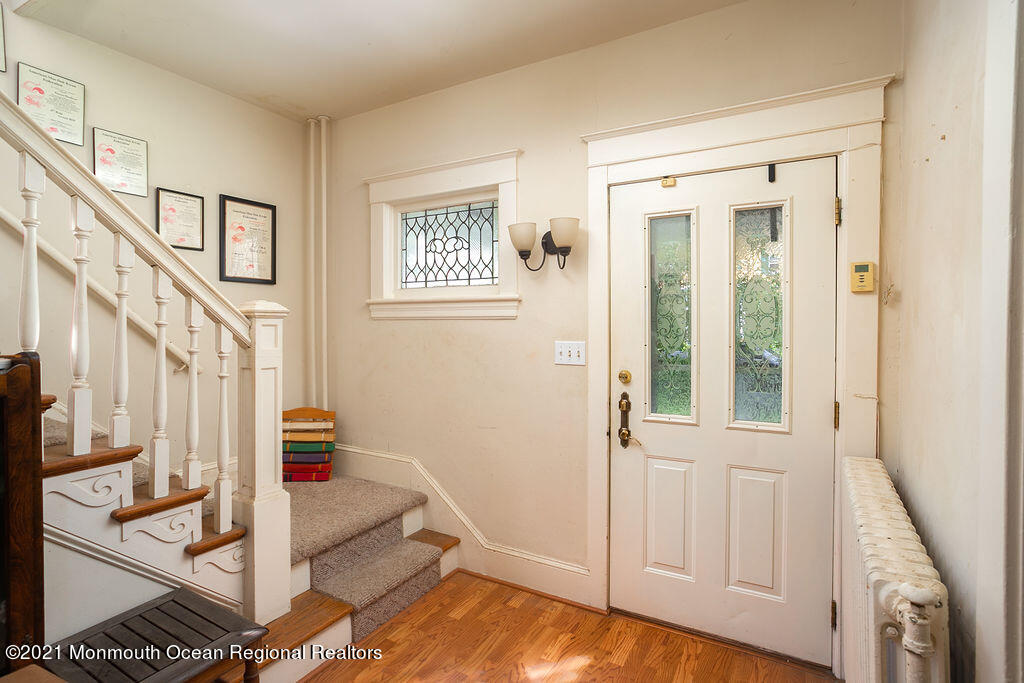 48 Ridgway Street Mount Holly, NJ 08060 - Photo 4 of 24 a view of an entryway with wooden floor and door
