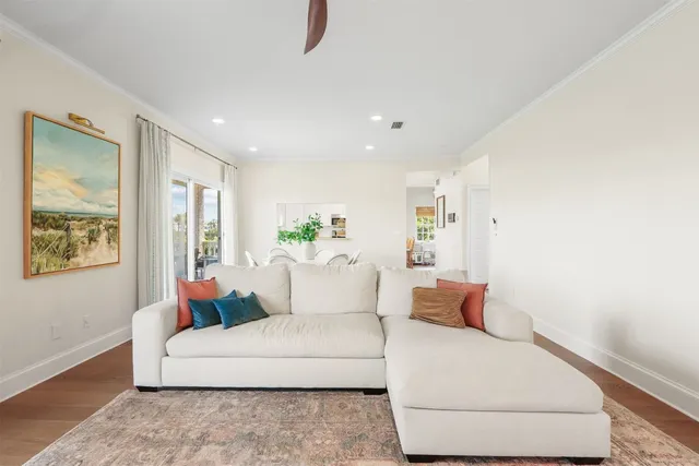 a living room with furniture and window