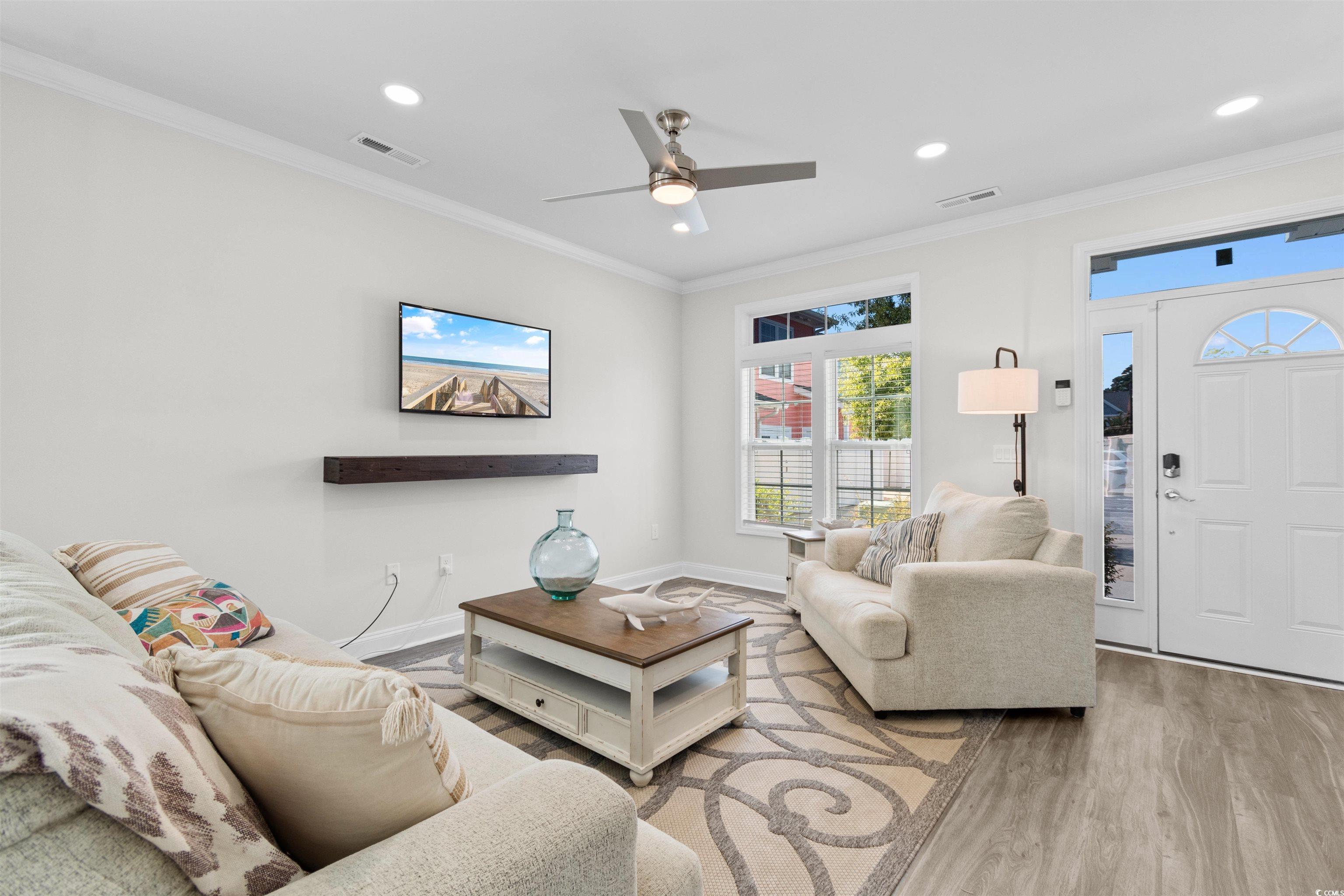 804 Moen Place, Unit F Myrtle Beach, SC 29577 - Photo 11 of 34 Living room featuring ornamental molding, recessed lighting, wood finished floors, and a ceiling fan