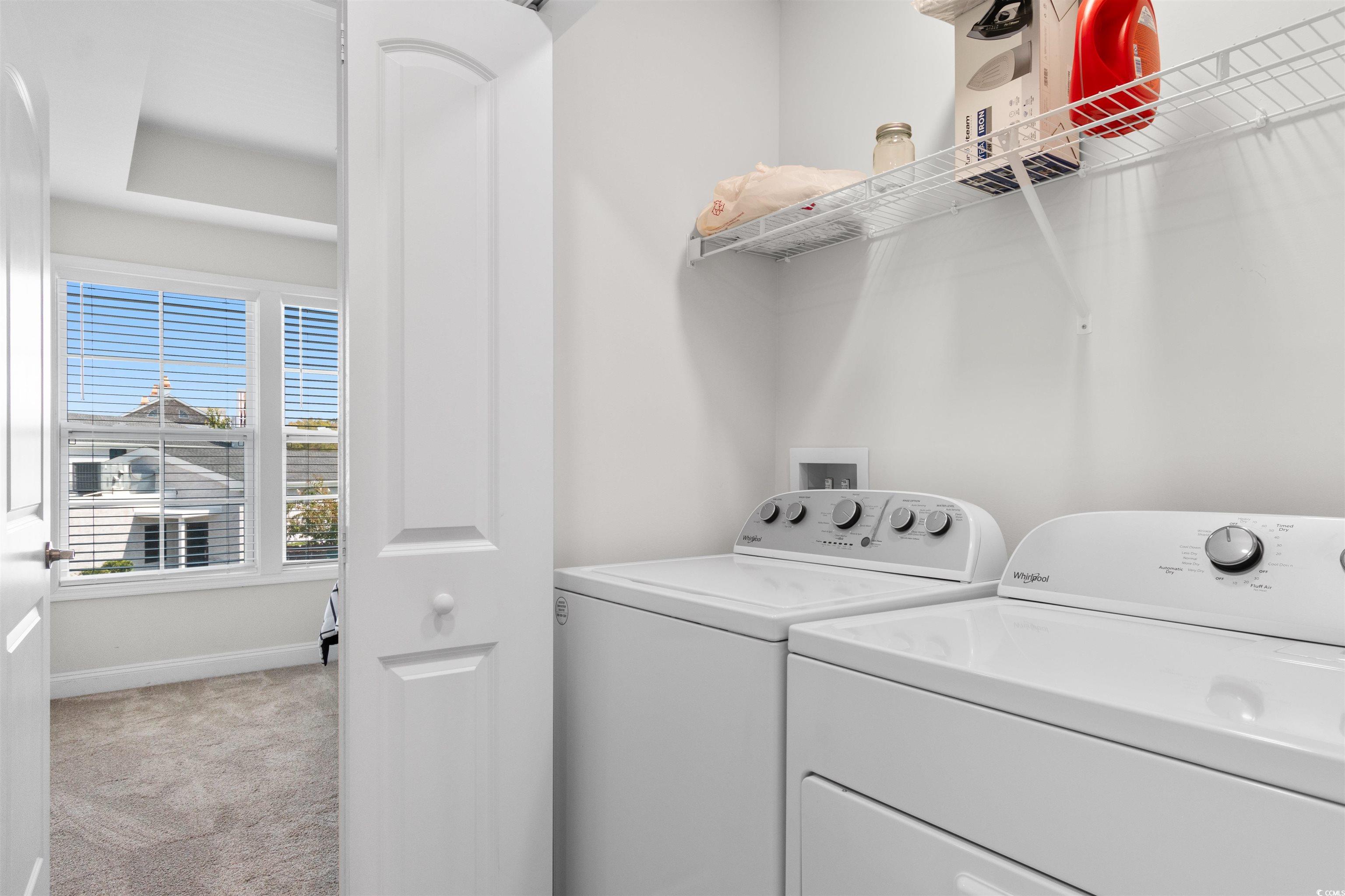 804 Moen Place, Unit F Myrtle Beach, SC 29577 - Photo 23 of 34 Washroom featuring light colored carpet and separate washer and dryer