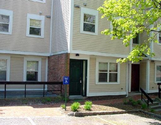 63 Highland Road Stamford, CT 06901 - Photo 1 of 1 a view of a house with a yard and large tree
