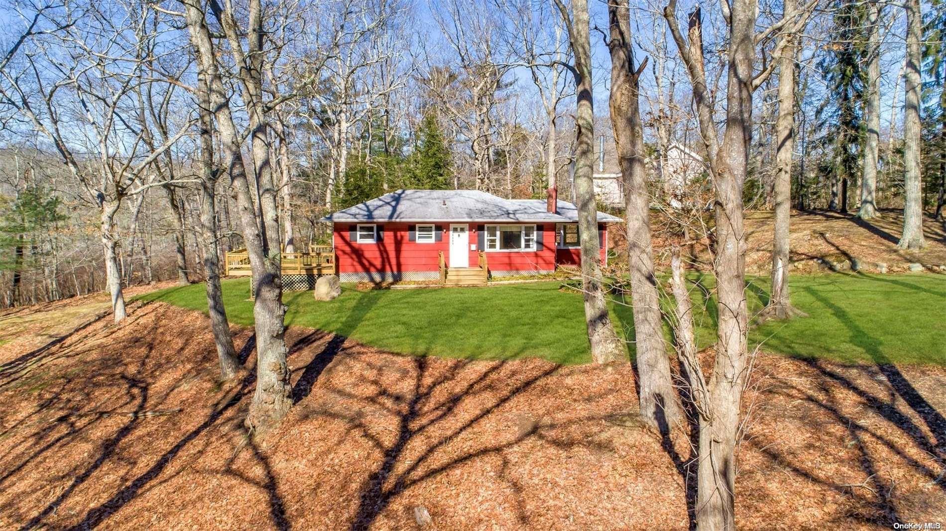 68 South Ferry Road Shelter Island, NY 11964 - Photo 1 of 1 a view of a backyard with a garden