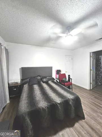 a bathroom with a bathtub and a sink