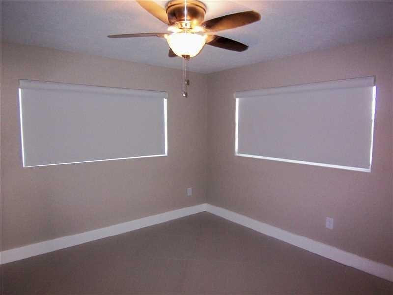 12031 Southwest 7th Street Miami, FL 33184 - Photo 11 of 12 an empty room with a window