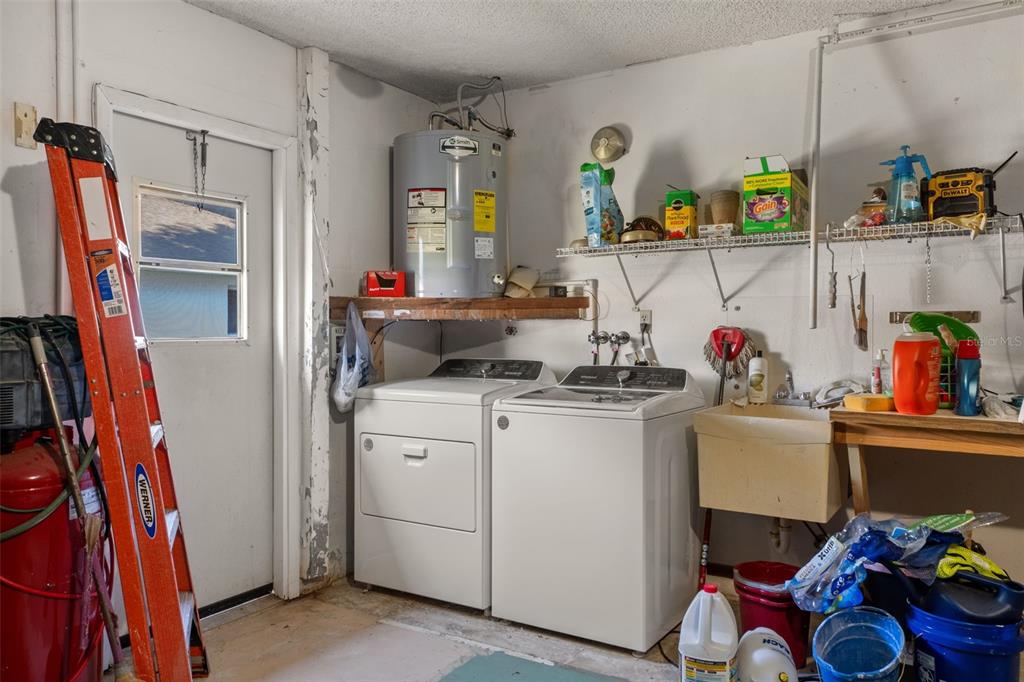 7606 Landmark Drive Spring Hill, FL 34606 - Photo 27 of 41 a view of storage and utility