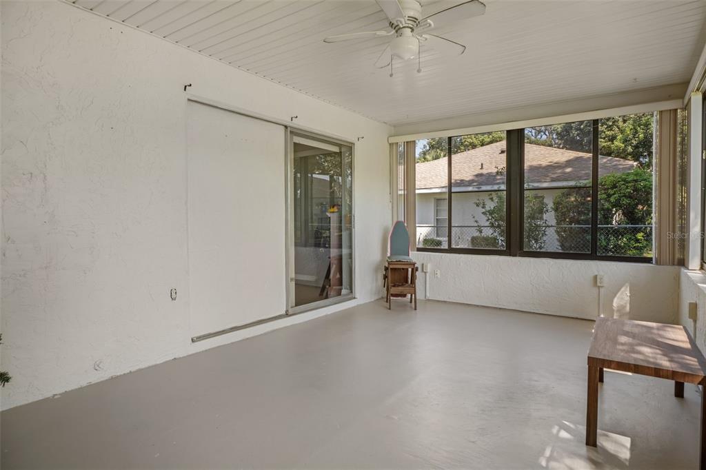 7606 Landmark Drive Spring Hill, FL 34606 - Photo 28 of 41 a view of an empty room with a window