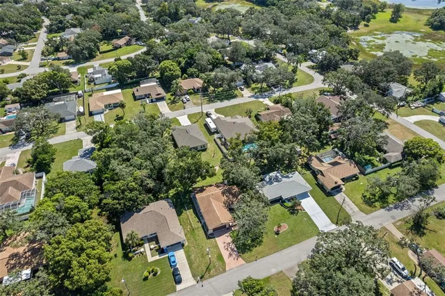 an aerial view of residential house with outdoor space