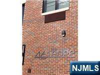 461 Palisades Boulevard, Unit 303 Fort Lee, NJ 07024 - Photo 13 of 13 a bathroom with a shower and a sink