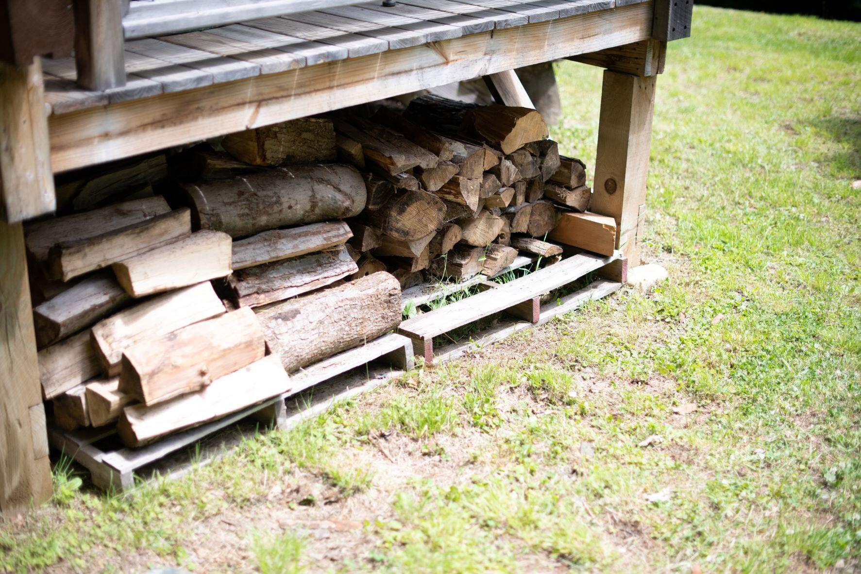 269 Jenkins Road Temple, ME 04984 - Photo 30 of 51 Cord of wood under porch