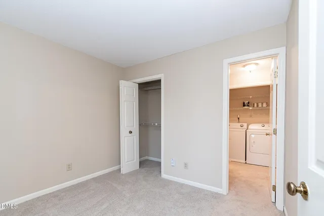 an empty room with a bathroom