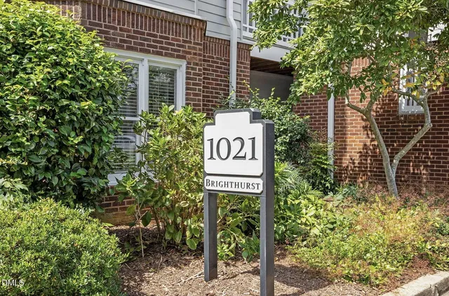 a sign broad in front of a building