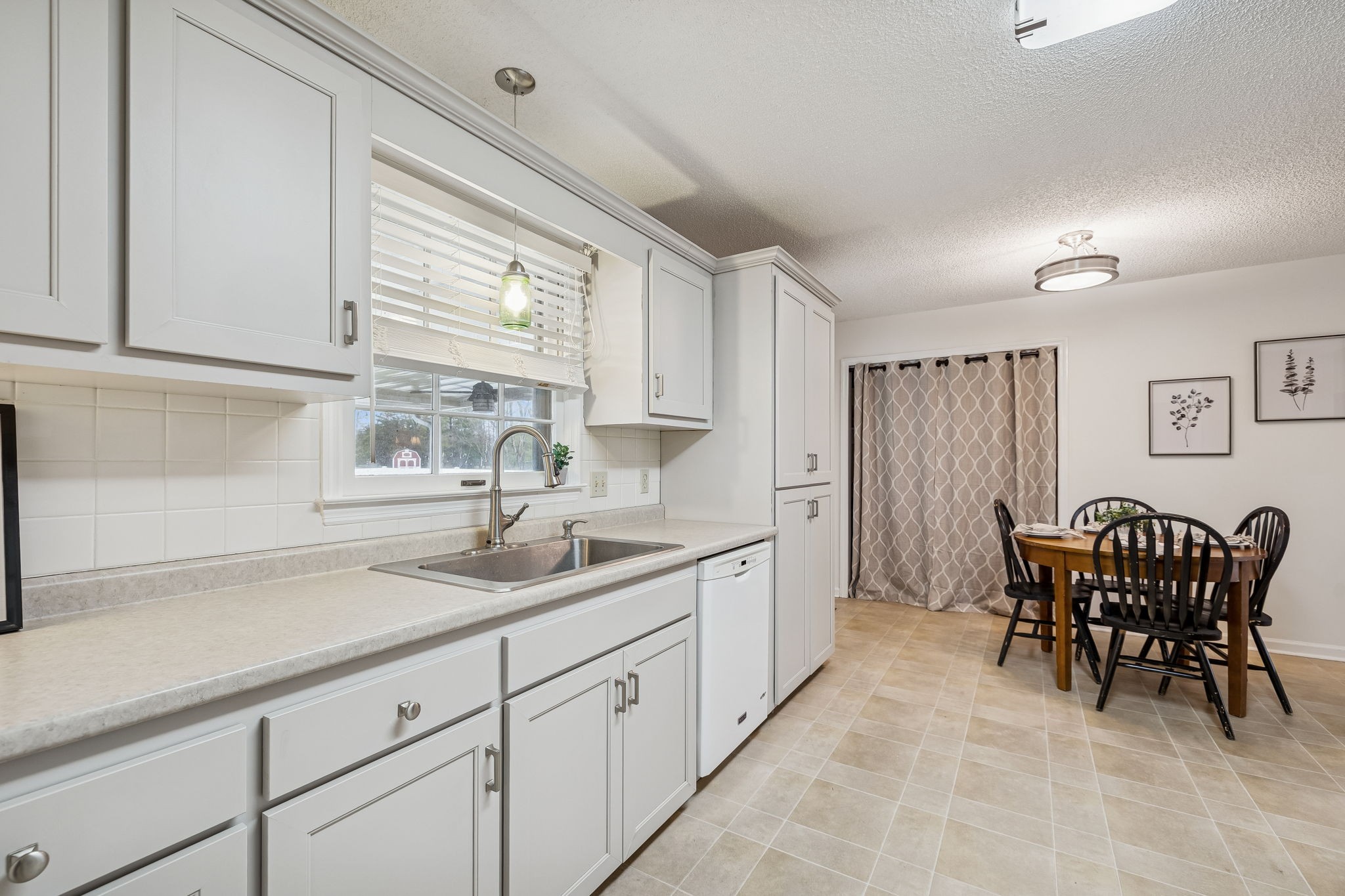 641 McKaig Road Murfreesboro, TN 37127 - Photo 14 of 51 a kitchen with a sink and cabinets