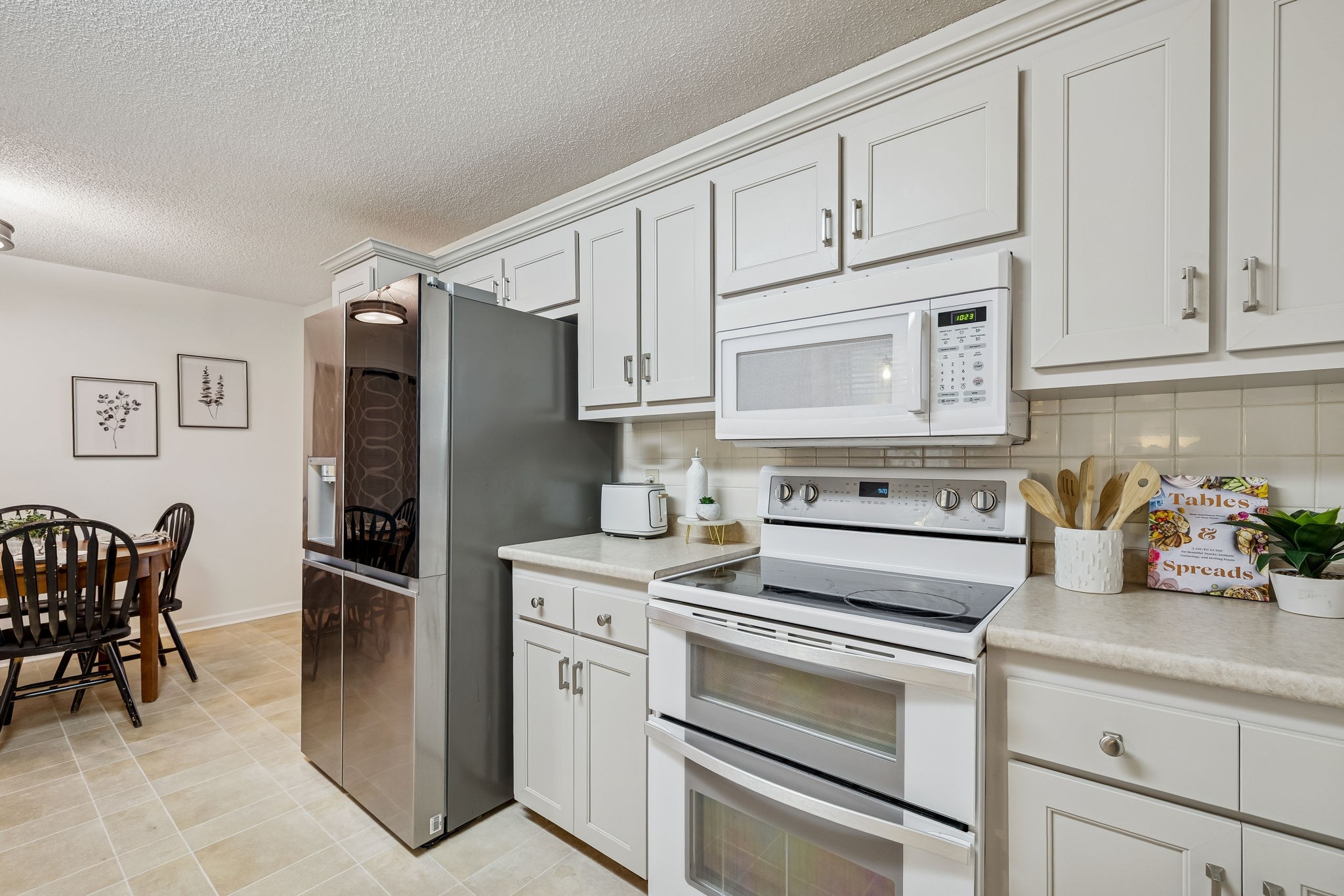 641 McKaig Road Murfreesboro, TN 37127 - Photo 15 of 51 a kitchen with cabinets and stainless steel appliances