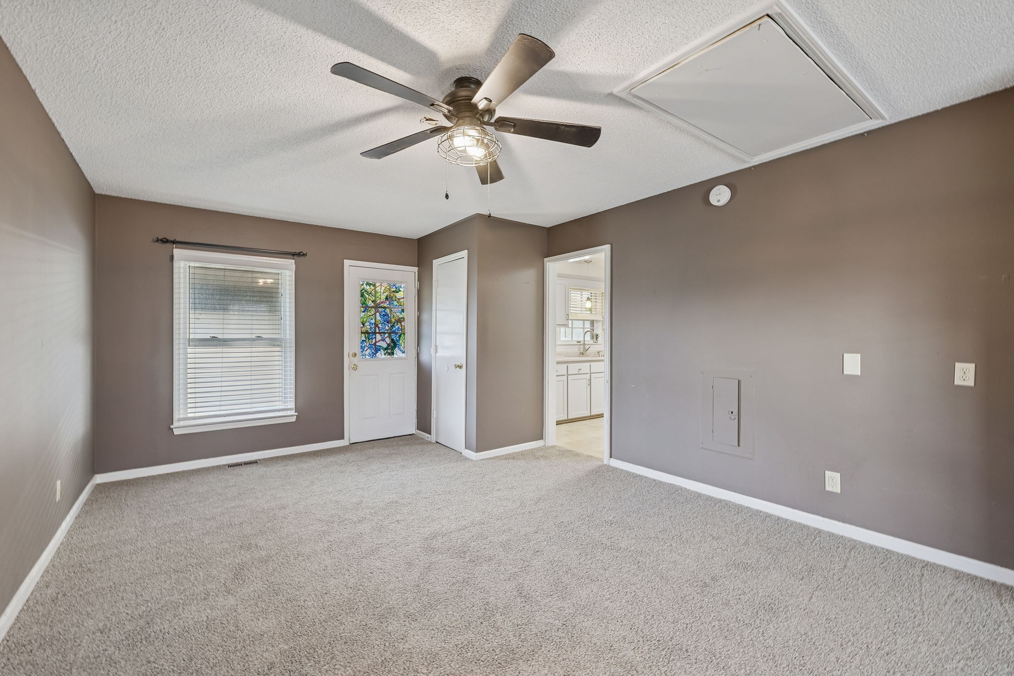 641 McKaig Road Murfreesboro, TN 37127 - Photo 17 of 51 an empty room with windows and fan