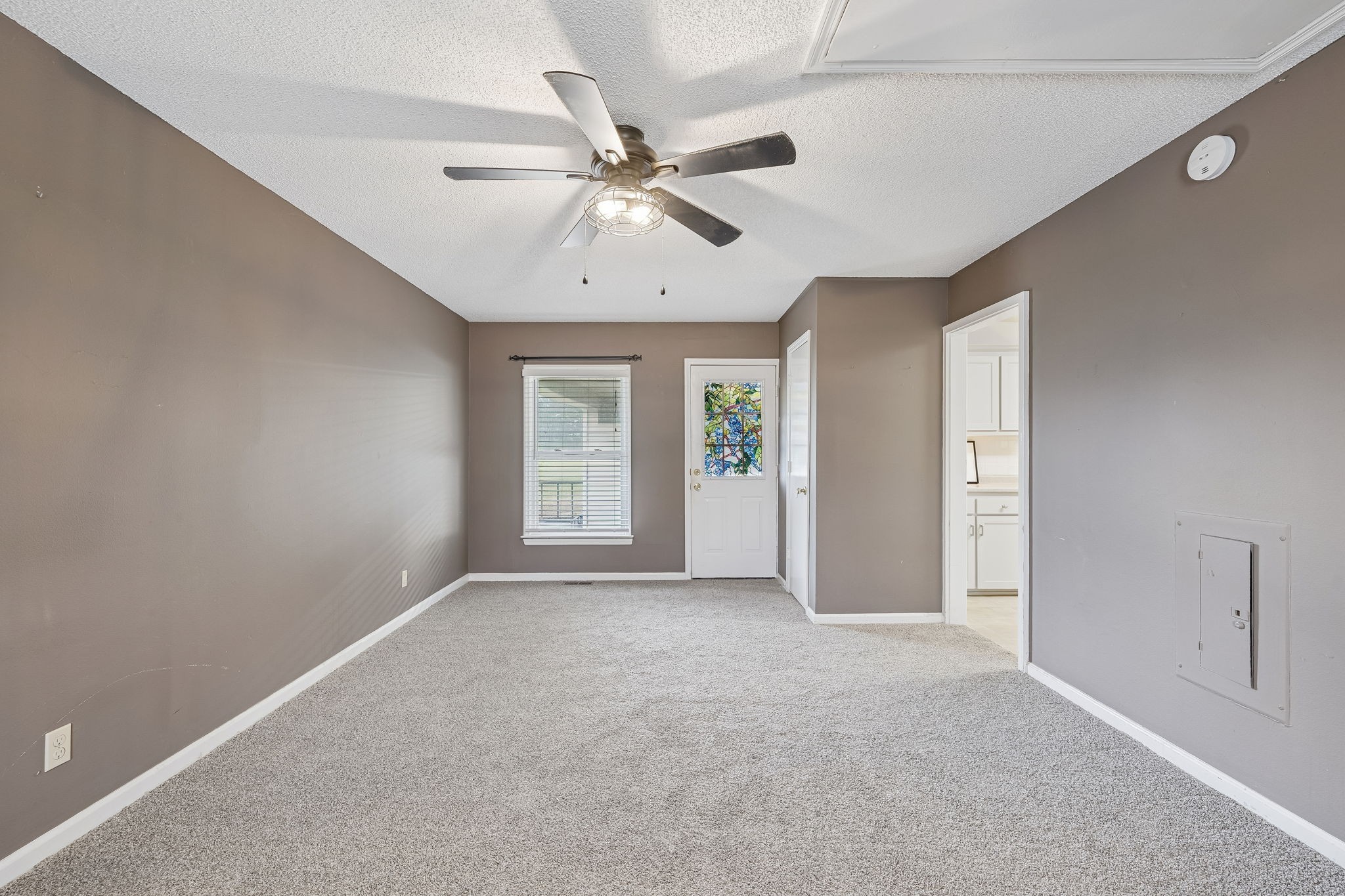 641 McKaig Road Murfreesboro, TN 37127 - Photo 18 of 51 an empty room with fan and windows