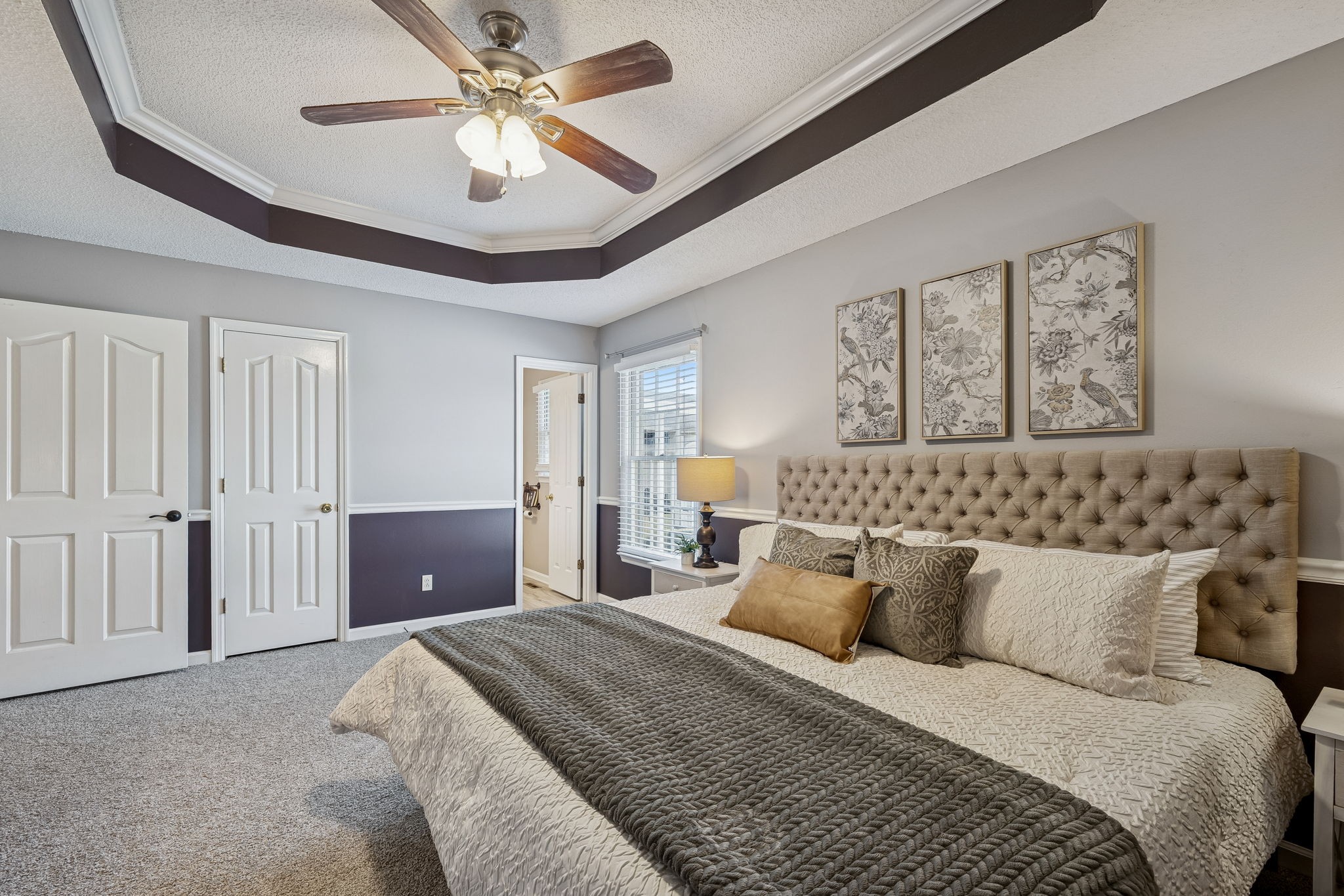 641 McKaig Road Murfreesboro, TN 37127 - Photo 21 of 51 a bedroom with a bed and a chandelier