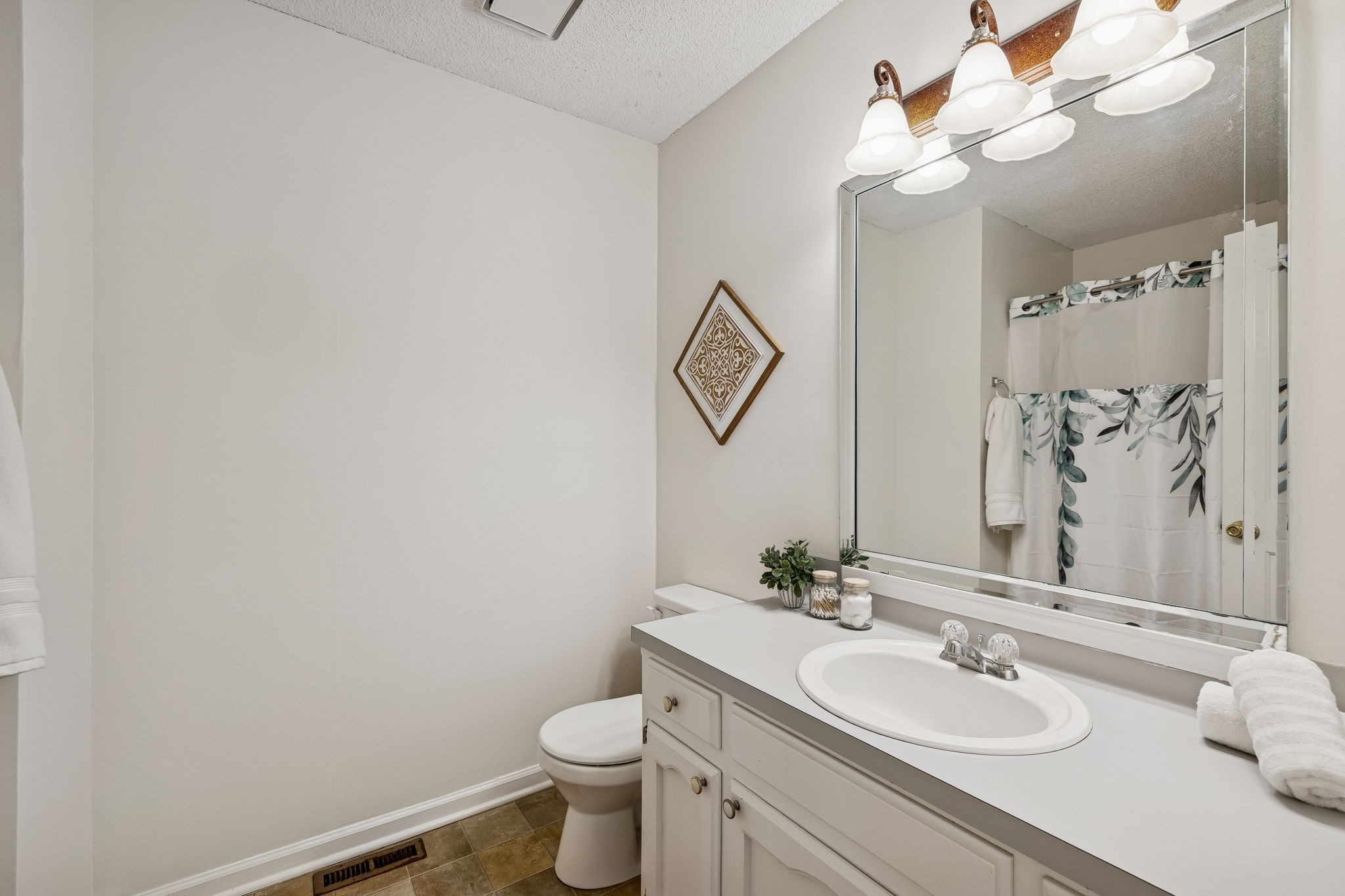 641 McKaig Road Murfreesboro, TN 37127 - Photo 27 of 51 a bathroom with a toilet sink and mirror