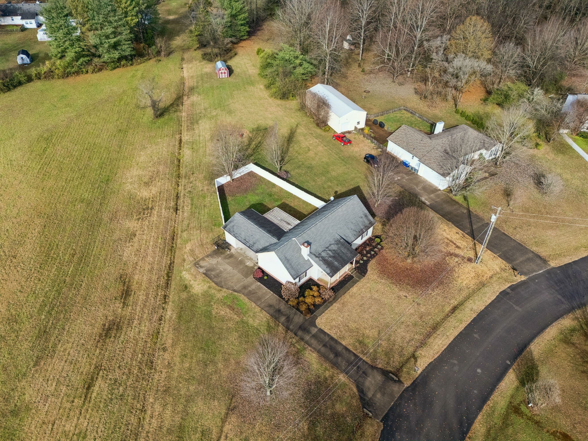 641 McKaig Road Murfreesboro, TN 37127 - Photo 42 of 51 an aerial view of a house with a yard and lake view