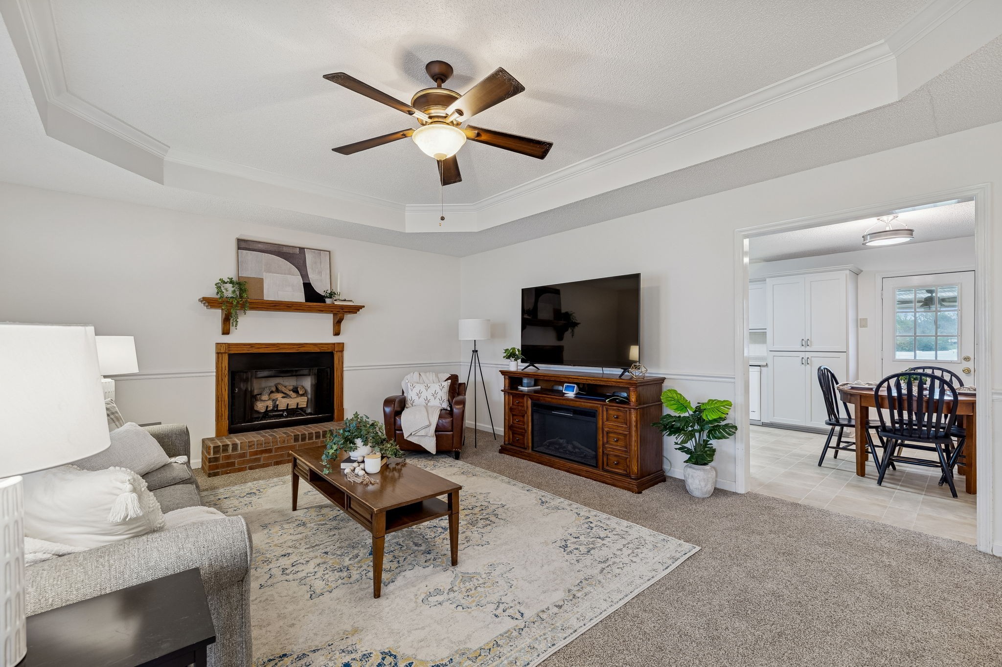 641 McKaig Road Murfreesboro, TN 37127 - Photo 6 of 51 a living room with furniture a fireplace and a flat screen tv