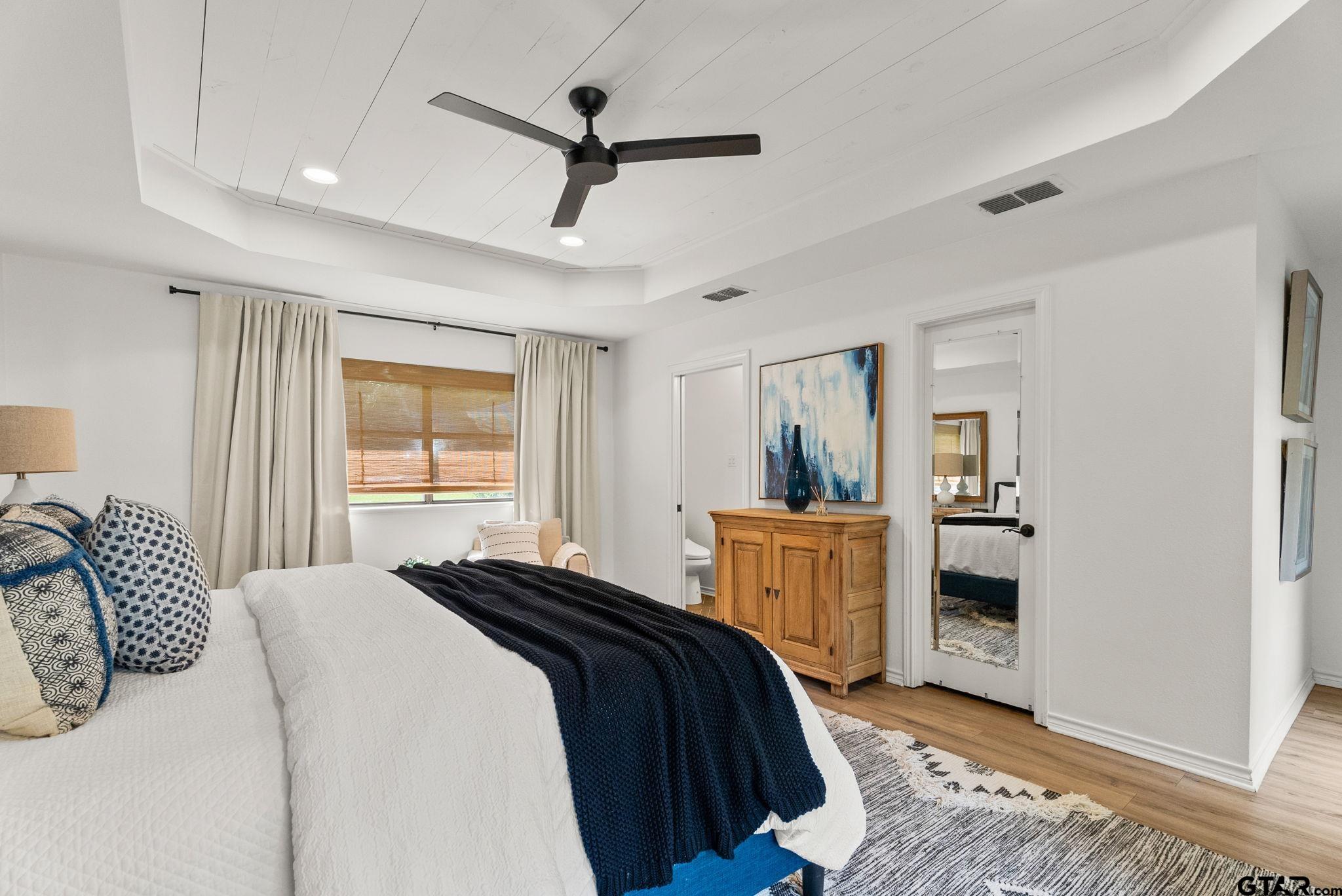 13235 Peninsula Road Whitehouse, TX 75791 - Photo 17 of 48 a bedroom with a bed and a window