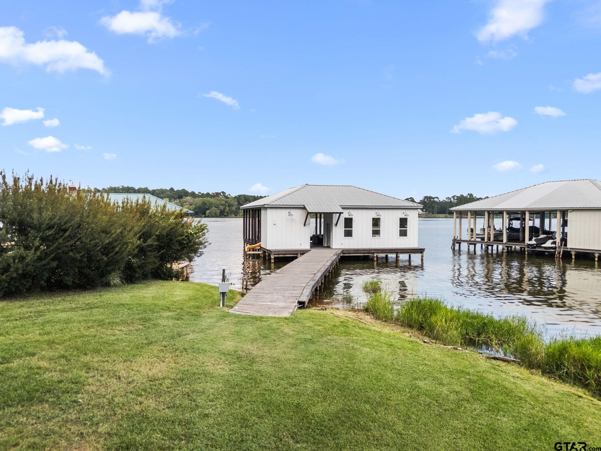 13235 Peninsula Road Whitehouse, TX 75791 - Photo 36 of 48 a front view of a house with garden