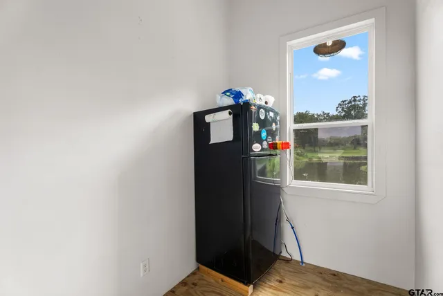a view of bedroom with a window